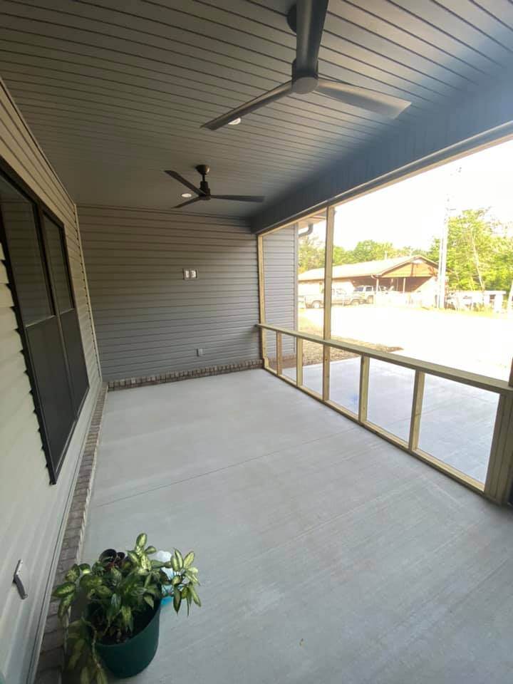Screened porch with ceiling fans in custom home by Debuty Builders, Knoxville, TN