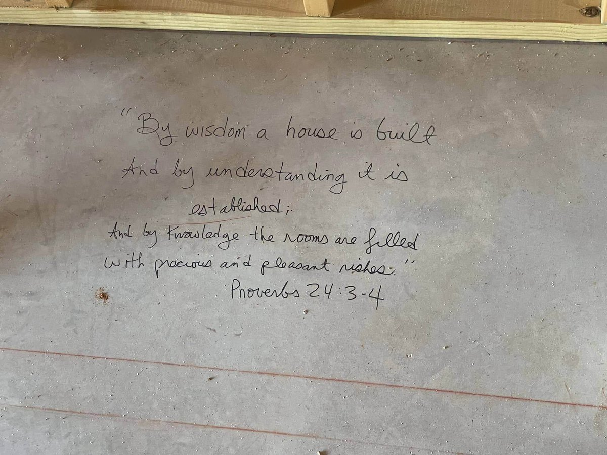 Bible verse written on the foundation of a custom home under construction in Knoxville, TN by Debuty Builders