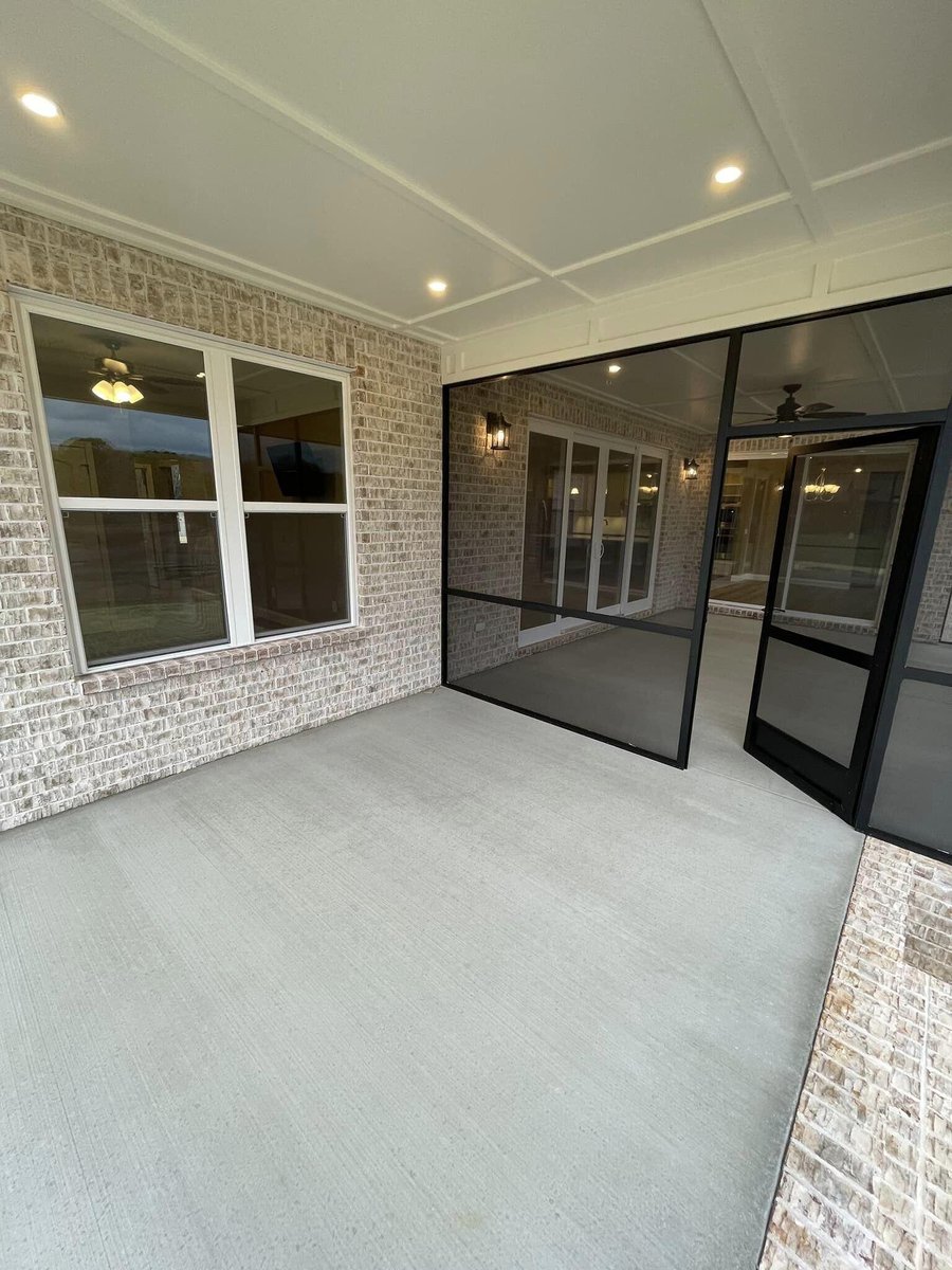 Screened-in patio attached to a custom home in Knoxville, TN by Debuty Builders