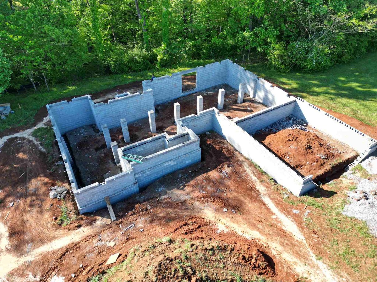 Aerial view of foundation work on a custom home project by Debuty Builders in Knoxville, TN