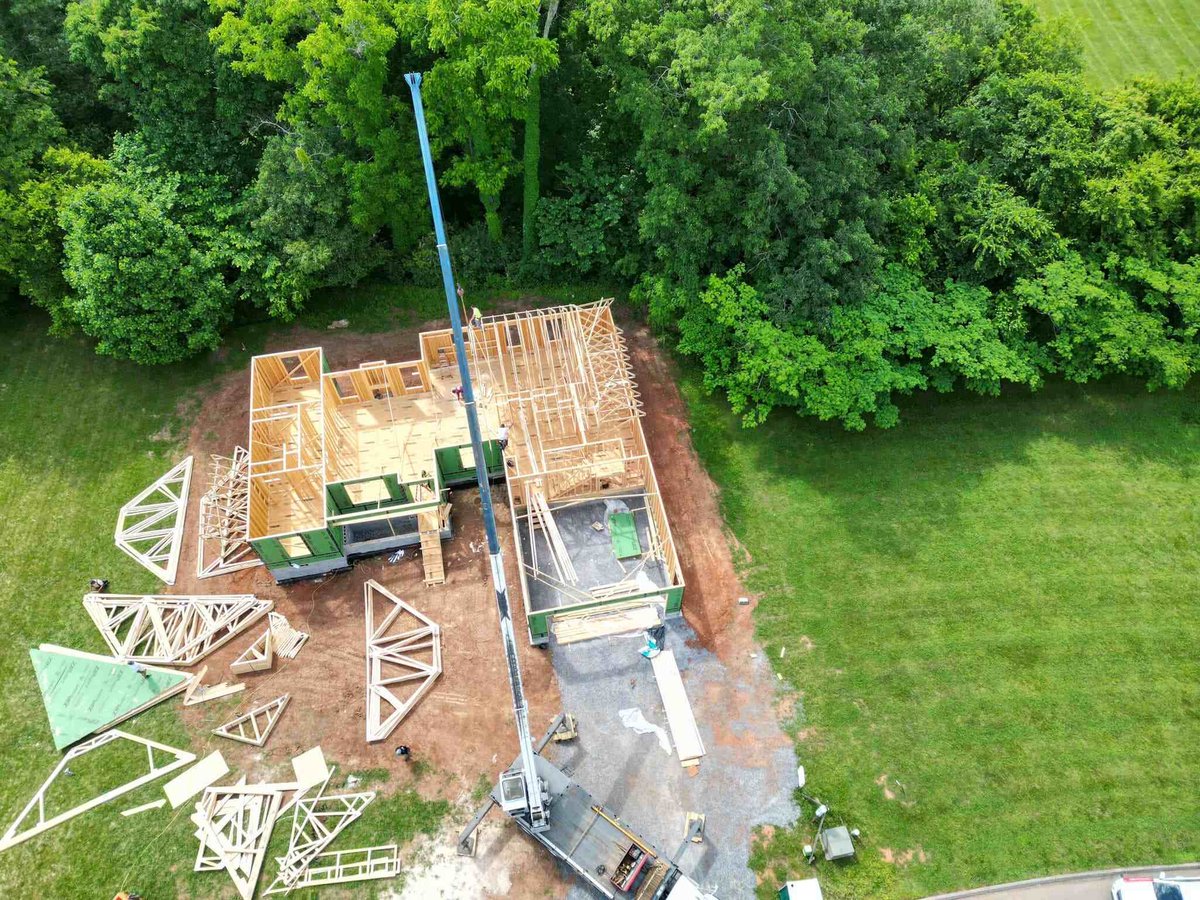 Aerial view of roof framing for a custom home by Debuty Builders in Knoxville, TN