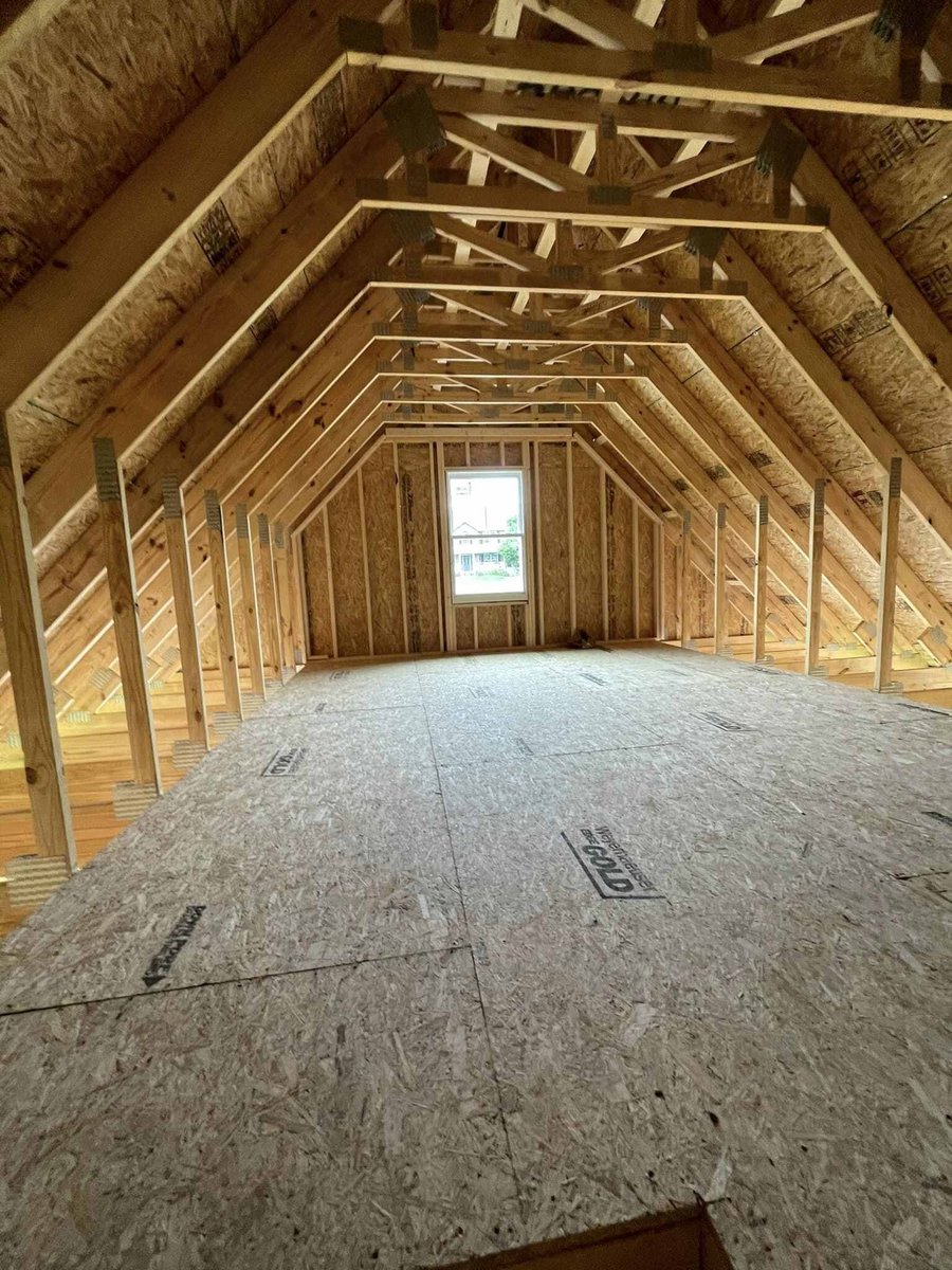 Attic framing and insulation space of a custom home under construction by Debuty Builders in Knoxville, TN