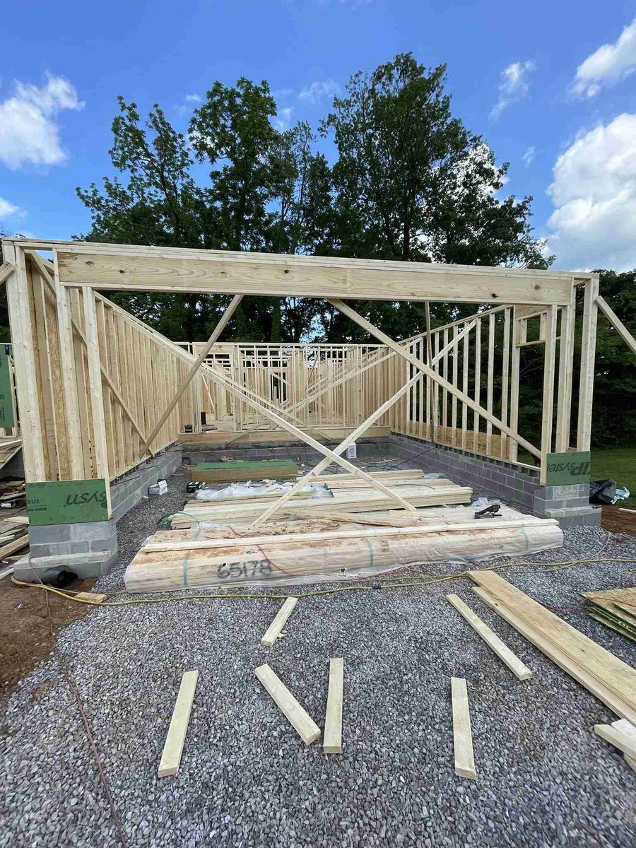 Wood framing underway for a custom home by Debuty Builders in Knoxville, TN