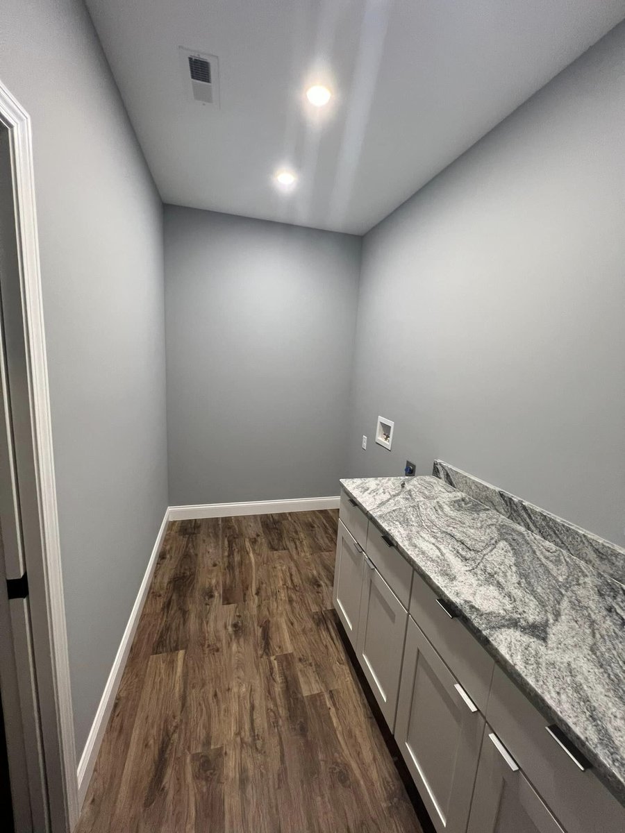 Utility room with granite countertop and ample cabinetry, Debuty Builders, Knoxville, TN