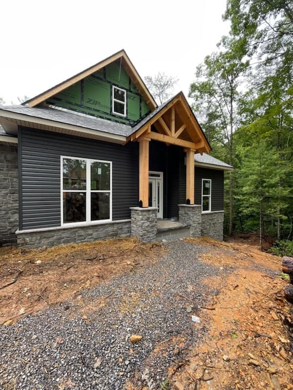 Front exterior view of custom home with modern design by Debuty Builders in Knoxville, TN