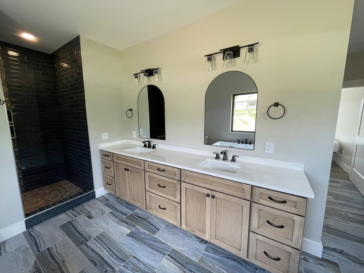 Custom bathroom cabinetry installation in progress by Debuty Builders in Knoxville, TN