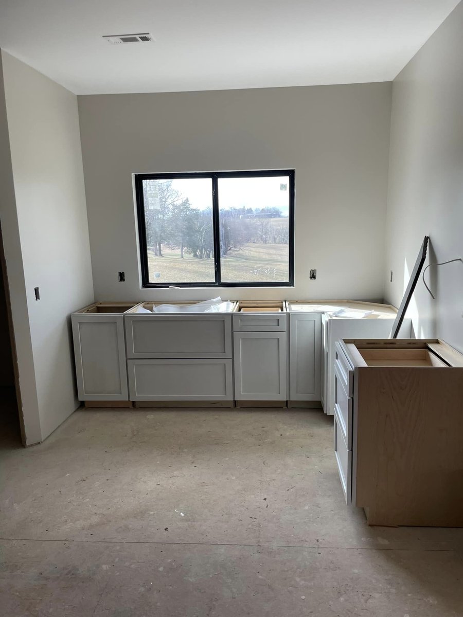 Partially completed bathroom with custom cabinetry by Debuty Builders in Knoxville, TN
