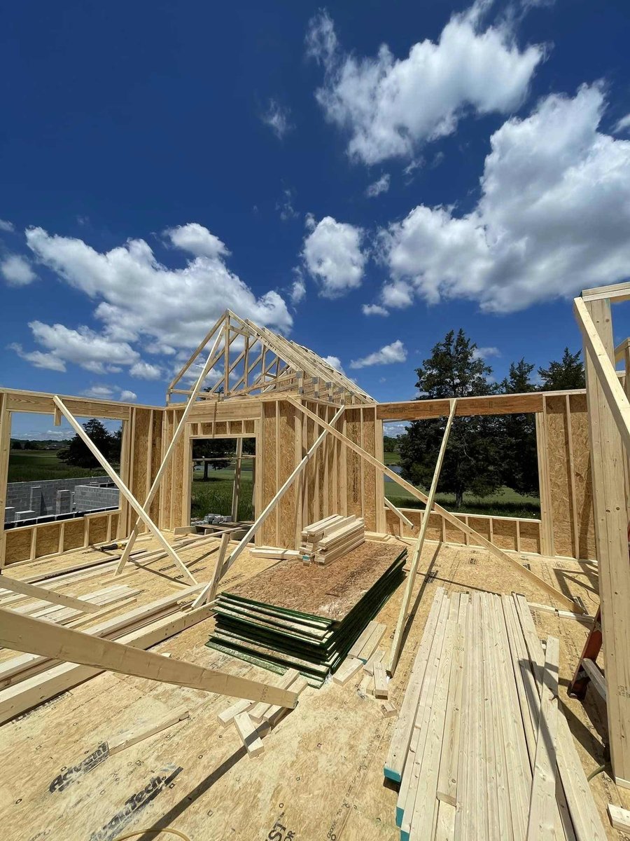 Framing in progress with trusses being installed on a custom home, Debuty Builders, Knoxville, TN