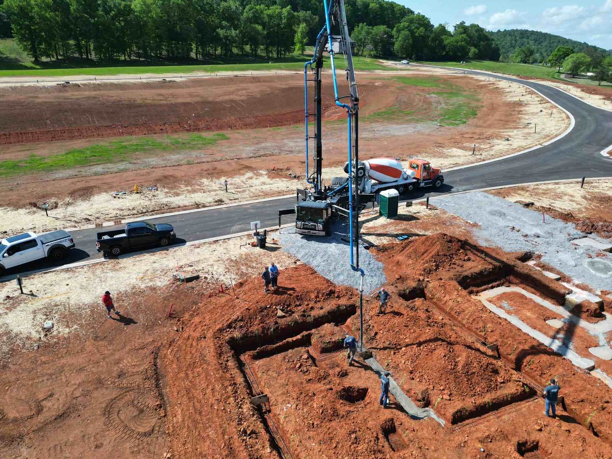 Overhead view of construction crew and machinery pouring concrete, Debuty Builders, Knoxville, TN