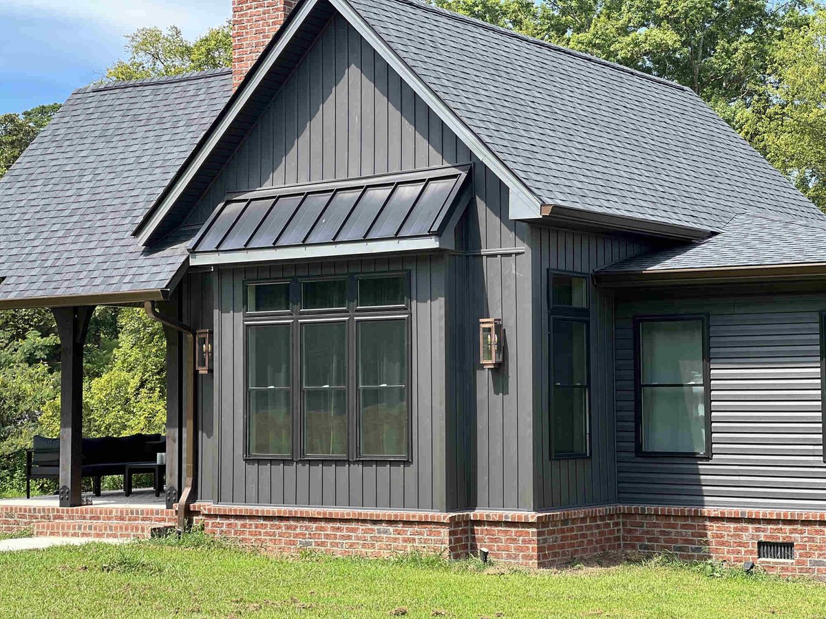 Custom home with a front porch and brick chimney by Debuty Builders, Knoxville, TN