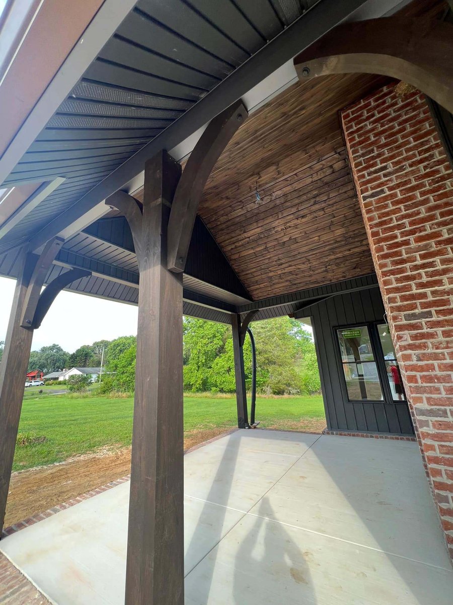 Front porch with custom wood and brick details by Debuty Builders, Knoxville, TN