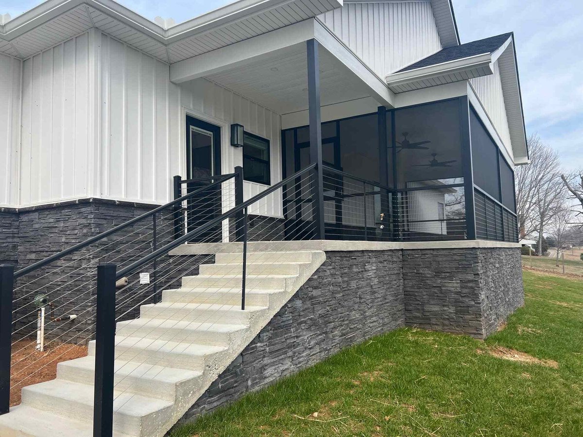 Back porch with cable railing on a custom home by Debuty Builders in Knoxville, TN