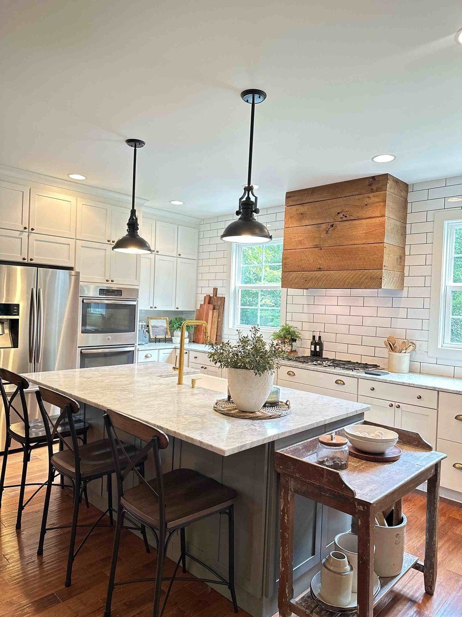 Modern farmhouse kitchen with white cabinets and subway tile by Debuty Builders, Knoxville, TN