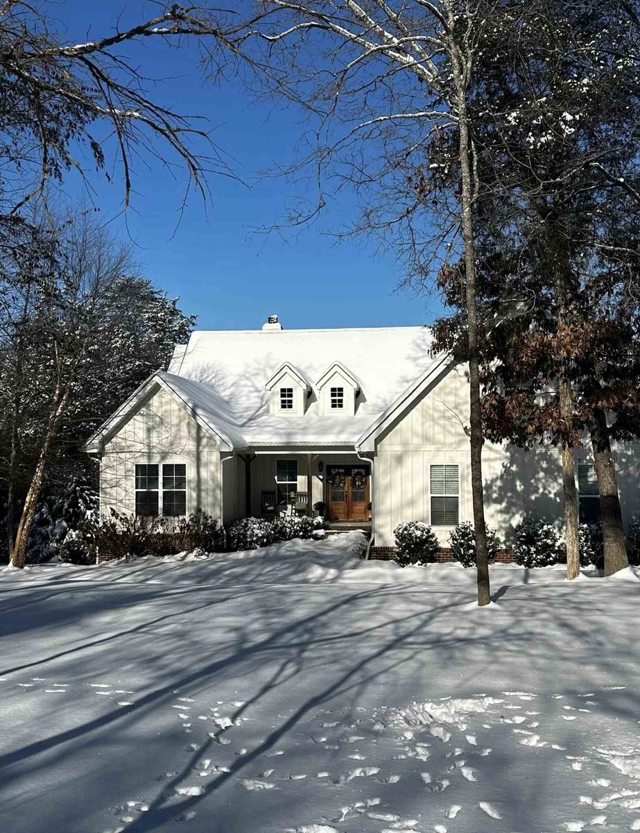 Snow-covered custom home built by Debuty Builders, Knoxville, TN