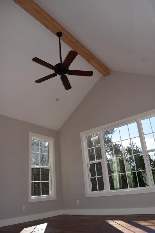 Vaulted ceiling with a wooden beam and ceiling fan in a custom home by Debuty Builders, Knoxville, TN