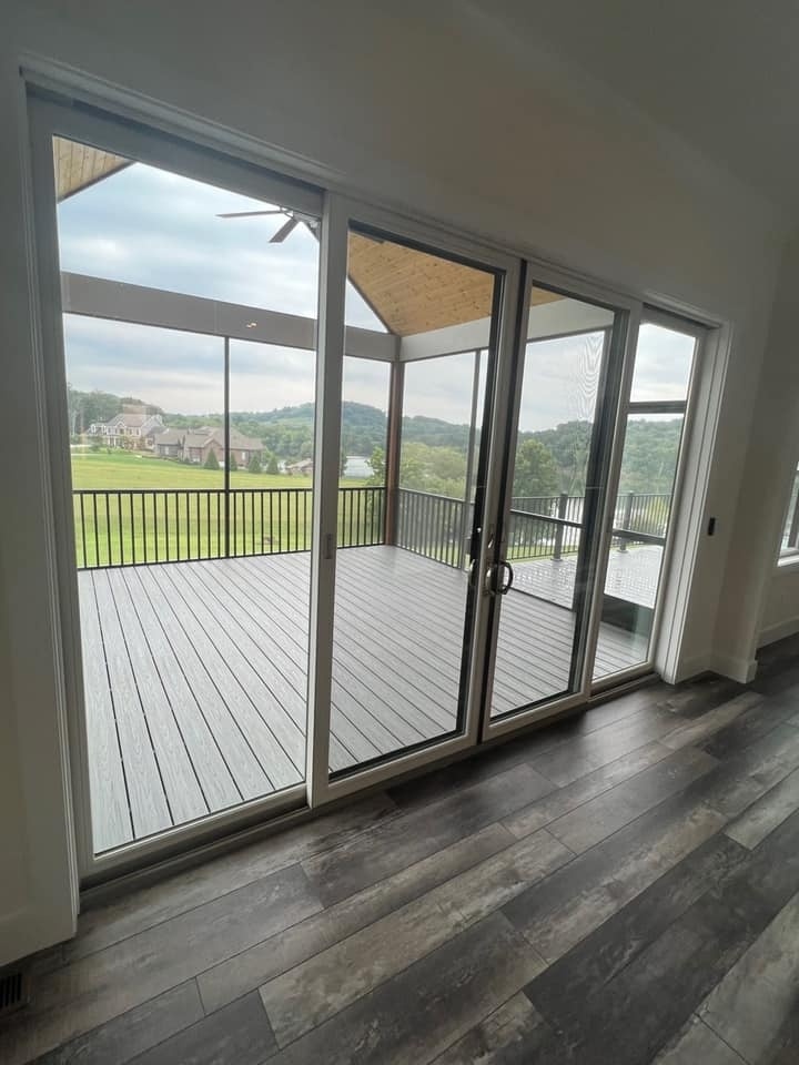 View of screened-in porch and sliding glass doors leading to a deck, in a custom home by Debuty Builders, Knoxville, TN