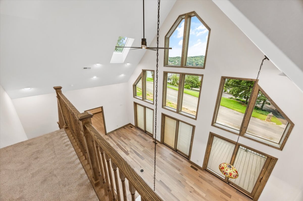 View from upstairs loft overlooking open living area in Friendsville Custom Home in Knoxville, TN
